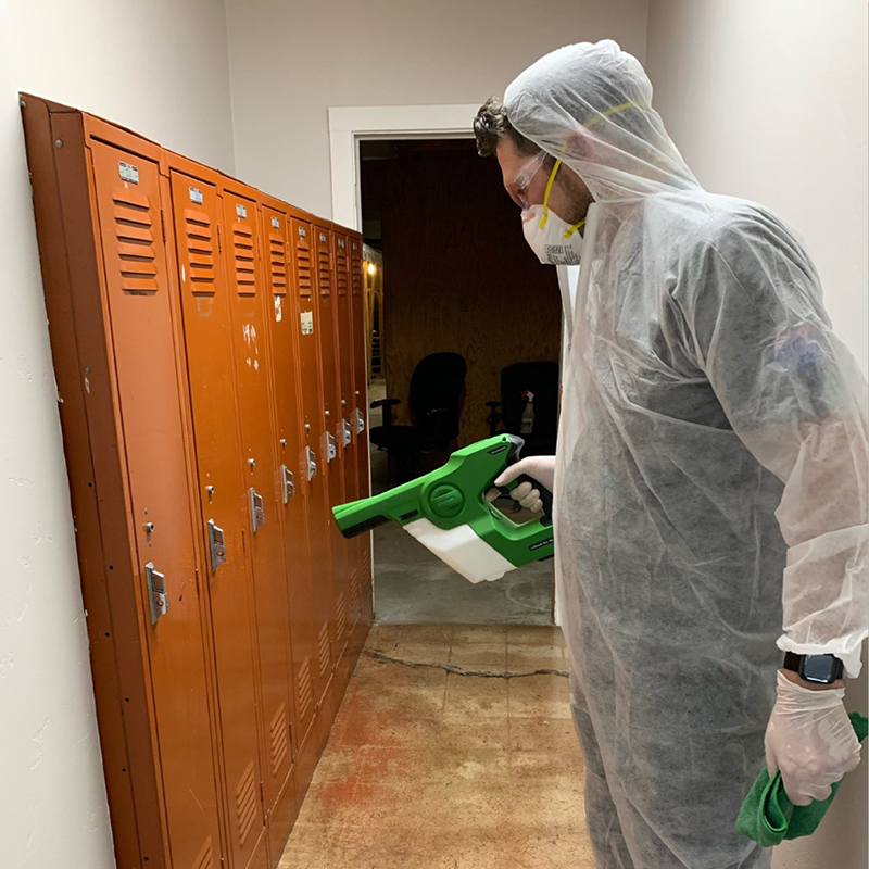 Locker disinfection performed by one of the employees of American Cleaning Services for our business clients. Lockers are thoroughly treated with a fog disinfector.
