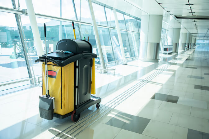 Business cleaning equipment at the airport. The picture is illustrating that American cleaning services is providing services to commercial clients across a number of industries